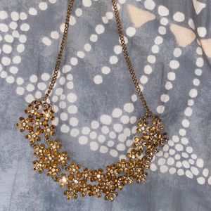 gold and silver flower necklace